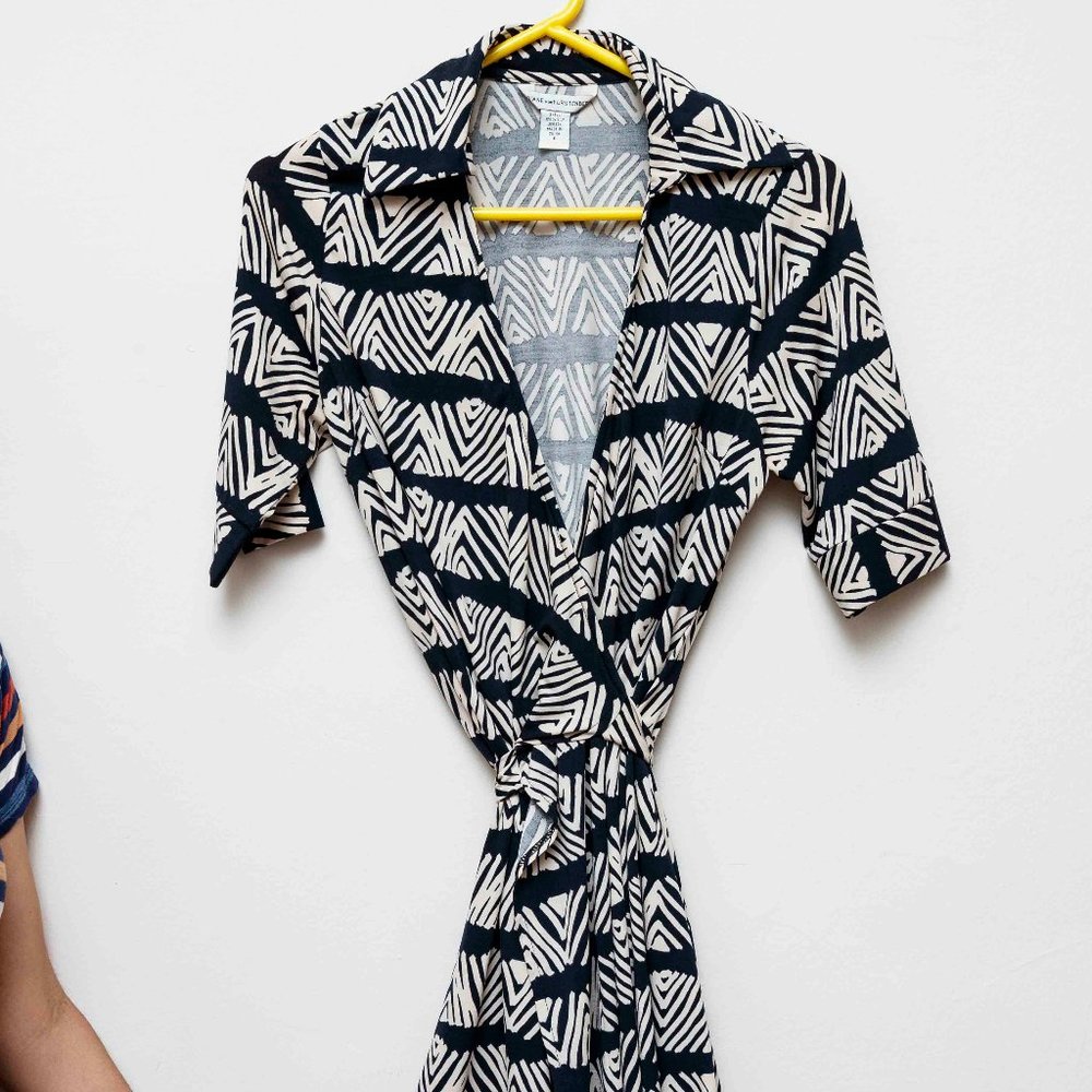 Navy blue and beige wrap dress with v-neck